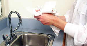 Household cleaning of kitchen sink with disposable wipes